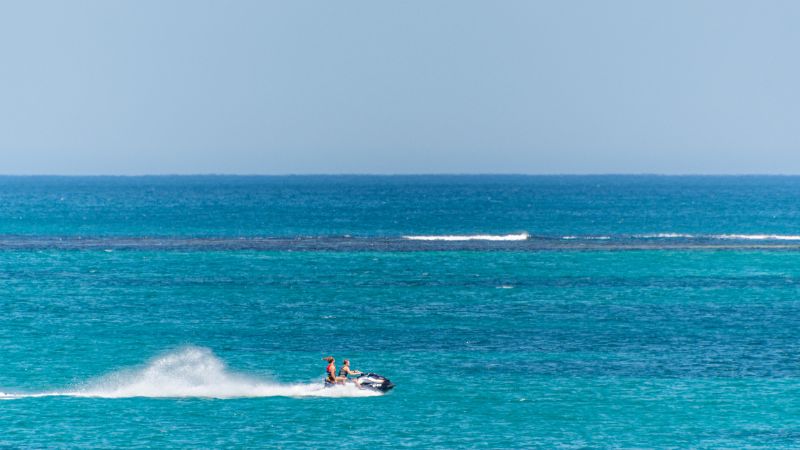 dubai-visa-jet-skiing-is-popular-on-the-waters-of-palm-beach-and-shoalwater-bay-168577718-min